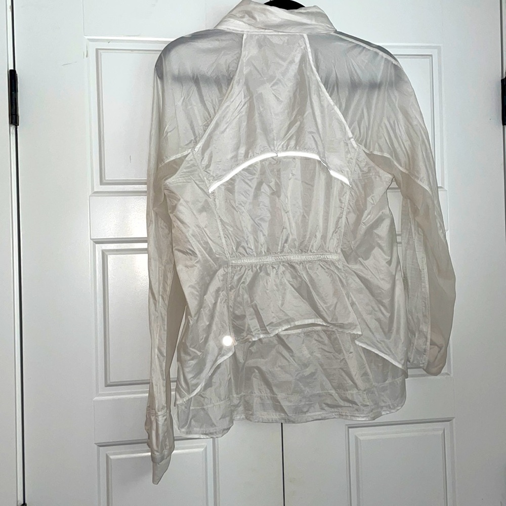 Lululemon white UV protector running jacket with hideaway hood